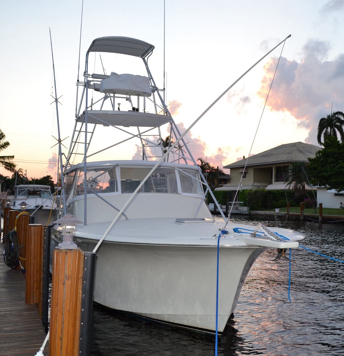 Bruce's custom 34-foot East Bay Boatworks express with tuna tower, tied up at the dock